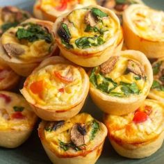 several mini quiches are stacked on top of each other