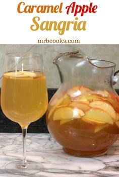 caramel apple sangria in a pitcher and glass on a marble counter with text overlay