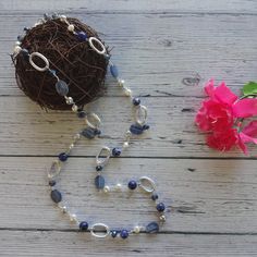 "Kyanite Sodalite and Cultured Fresh Water Pearl Long Rosary Style Necklace 36\" L. Color: Blue Lobster claw clasp sterling silver Kyanite sodalite cultured pearl crystal thread Wire Non tarnish made in the USA. Aluminum chain rings. Beaded wire wrapped." Blue And White Necklace, Blue Lobster, Rosary Style Necklace, Chain Rings, Lapis Lazuli Necklace, Pearl Crystal, White Necklace, Station Necklace, Fresh Water Pearl