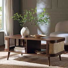 a living room with a coffee table and chairs