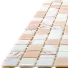 a white and pink tile pattern is shown