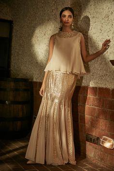 Ivory Mermaid Fit And Flare Skirt In Dual Colored Sequins Sheeting Paired With Bias Georgette Top With Cheeta On Neck And Armhole To Order: +91 9725362767 Indowestern Dresses, Diwali 2024, Sequin Skirts, Shahid Khan, Mermaid Fit, Indian Bridesmaids, Gaun Fashion, Embroidered Lehenga, Fit And Flare Skirt