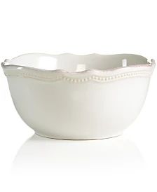 a white bowl sitting on top of a table