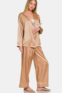 A Satin Long Sleeve Shirt and Long Pants 2 Piece Set is a stylish and versatile outfit featuring a relaxed fit and made from satin fabric for a luxurious and sleek look. The long sleeve shirt has a button-down closure at the front for easy wearing, while the pants feature an elastic waist for comfort and a perfect fit. This set is perfect for a chic and put-together outfit for various occasions. Features: Basic style Number of pieces: Two-piece Sheer: Opaque Stretch: Slightly stretchy Material c Gold Pajamas, Elastic Waistband Pants, Satin Long Sleeve, Satin Pyjama Set, Versatile Outfits, Satin Pajamas, Sleepwear & Loungewear, Elastic Waist Pants, Sleek Look