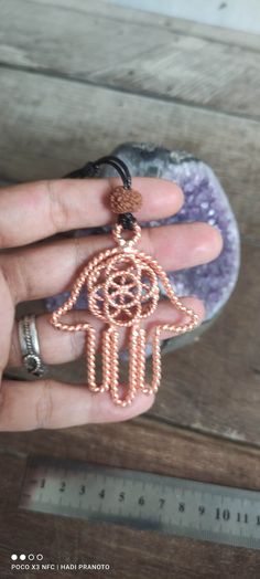 This Blessing Hamsa pendant uses the sacred cubits (144mhz) and the seed of life uses the lost cubits (177mhz) The Hamsa hand symbolism of it being down is abundance and positivity. This style invites positive things into your life. Spiritual Bronze Jewelry For Meditation, Spiritual Copper Necklace For Healing, Bronze Spiritual Jewelry For Blessing, Holistic Handmade Jewelry For Good Luck, Spiritual Copper Necklace For Meditation, Spiritual Copper Jewelry For Meditation, Bronze Spiritual Jewelry For Good Luck, The Seed Of Life, Positive Things