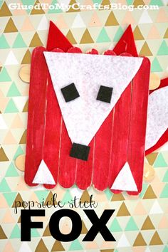 popsicle stick fox craft with the words popsicle stick fox on it and an image of