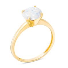 This blissful fashion ring tops off her tailored look with ease and flair. Crafted in warm 10K gold, this tasteful day-to-evening design features an 8.0mm round lab-created iridescent opal cabochon. Buffed to a brilliant luster, this simple yet refined style is certain to be a constant choice. Elegant 14k Gold Moonstone Ring With Round Band, Elegant 14k Gold Moonstone Ring With Center Stone, Elegant Moonstone Ring With 14k Gold Round Band, Elegant Moonstone Ring With 14k Gold Center Stone, 14k Yellow Gold Brilliant Cut Opal Ring, Elegant 14k Gold Solitaire Moonstone Ring, Elegant Yellow Gold Moonstone Ring With Round Band, Elegant Formal Solitaire Moonstone Ring, Elegant Yellow Gold Moonstone Ring