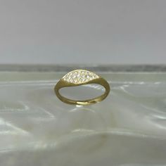 This delicate ring is 10k yellow gold and adorned with diamonds. size 6 Made in Brooklyn, NY 14k Gold Diamond White Signet Promise Ring, Heirloom Gold Diamond Stackable Rings, Classic Open Diamond Ring With Accents, 14k Gold Cluster Ring With Single Diamond, Vvs Clarity 14k Gold Diamond Ring, Luxury 14k Gold Diamond Ring With Pave Setting, Timeless Gold Engraved Ring With Diamond Accents, 14k Gold Luxury Diamond Ring With Pave Setting, 14k Gold Diamond White Open Ring