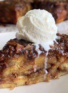 a slice of pecan pie with ice cream on top