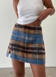 Stand out this Holiday Season with our Slit Plaid Detail Mini Skirt. A timeless print & style - a Highly Praise favorite. DETAILS Brown & blue plaid patterns Slit detail 100% Polyester Washing Instructions: Hand wash cold, hang to dry Et Clet is a women's contemporary clothing brand that offers timeless yet modern styles for the fashion-forward woman. With its focus on effortless style and timeless design, Et Clet is a go-to brand for the modern woman who wants to elevate her wardrobe. Sparkly Corset, Brown Mini Skirt, Bride Lingerie, Romantic Date Night, Romantic Date, Spring Boho, Pinterest Outfits, Plaid Mini Skirt, Contemporary Outfits