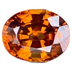 an orange diamond on a white background