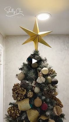 a christmas tree decorated with ornaments and a star