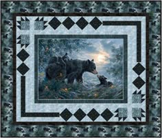 two bears are walking through the woods in front of a blue and black quilted wall hanging