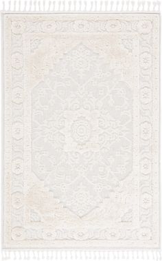 a white rug with an intricate design on it