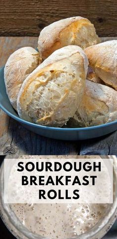 a bowl of soup and some bread rolls on a plate with the words, sourdough breakfast rolls