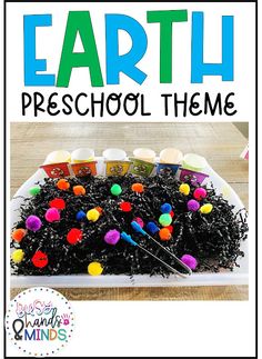 the earth preschool theme is shown with an image of black shredded paper and colorful pom poms