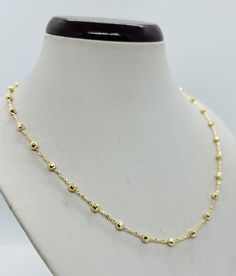 "14K YELLOW GOLD 3.5mm Diamond Cut Fancy Beaded chain These chains are made with solid 14k gold. The beads are 3.5mm in width and are connected with 1.5mm rolo style chain and is available in 16\", 18\", 20\",22\", 24\". Beaded chain are especially known for their shine. The chains are diamond cut and very shiny. Can be worn by itself or with a charm. The approximate weight of the 18\" is 8.4 grams. The chains have lobster claw for additional security. The chains have 14K marked for Authenticity 14k Gold Single Strand Chain Necklace In Yellow Gold, 14k Yellow Gold Single Strand Chain Necklace, Yellow Gold Beaded Chain Necklace, Yellow Gold Satellite Chain Necklace With Round Beads, 14k Gold Ball Chain Necklace, 14k Gold Beaded Chain Necklace With Round Beads, Yellow Gold Jewelry With Ball Chain And Round Beads, Yellow Gold Plated Round Beaded Necklaces, 14k Gold Beaded Chain Necklace