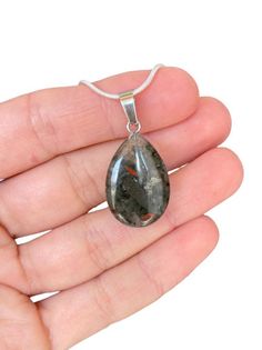 Bloodstone Necklace - Heliotrope Stone - Bloodstone Crystal Choker - Silver Bloodstone - Chakra Healing Gift - Romantic Gift 1 pc. Bloodstone teardrop necklace, silver chain. Pendant size : 1.1 inch / 3 cm Available chain lengths: 16 inch / 40 cm 18 inch / 45 cm 20 inch / 50 cm 22 inch / 55 cm 24 inch /60 cm Gemstones characteristics and metaphysical properties: Bloodstone: Bloodstone meditation is excellent for those times when you are beginning a new project, a new stage in life or for protect Heliotrope Stone, Bloodstone Crystal, Bloodstone Necklace, Chakra Heilung, Silver Chain Pendant, Choker Silver, Crystal Choker, Teardrop Necklace, 925 Sterling Silver Chain