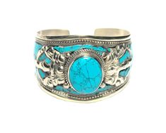 PRICES MAY VARY. Versatile Statement Piece - made of blue Stabilized-Turquoise & Argentium plated stainless steel, designed for men & women. SLIGHTLY ADJUSTABLE, very comfortable & fits most wrist sizes. High quality & Durable - Designed for everyday wear or special occasions. The perfect surprise gift for mom, dad, mum-in-law, sister, daughter, friend, or anyone else. Elegant accessory to up your jewelry fashion game. Bracelet comes with a cute, FREE jewelry pouch. Jewelry from Nepal - a bold c Boho Cuff Bracelet, Boho Cuff, Comfortable Fits, Turquoise Bracelet Cuff, Womens Jewelry, Turquoise Cuff, Western Jewelry, Bracelet For Men, Surprise Gift