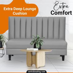 the extra deep lounge cushion is next to a table with a potted plant on it