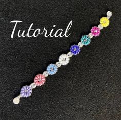 the beaded bracelet is decorated with colorful flowers