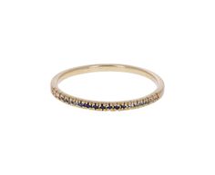 With a quiet, regal, and understated sophistication, this Rebecca Overmann ring is a striking, modern alternative to the traditional wedding band. The blue gray sapphires are prong set in the 14K yellow gold band according to tone. A wedding band alternative or addition to a stacking set! 14K yellow gold band width : 2mmsapphires : 1mm diameter each : .10cttwsize available : 6.75please contact us for sizing options Traditional Wedding Bands, Grey Sapphire, Rebecca Overmann, Gold Band, Traditional Wedding, Gold Bands, Blue Gray, Prong Setting, Blue Sapphire