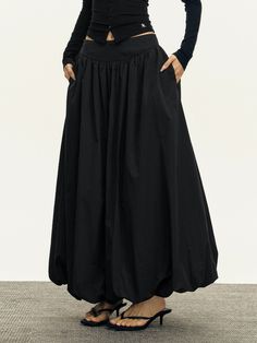 Discover the charm of effortless styling with our Flowy Maxi Bubble Skirt, a harmonious blend of function and fashion.Expertly crafted from 100% polyamide fiber, this skirt exhibits a luxurious texture and offers a breezy A-line silhouette. The low-waist design and solid color provide a street-style aesthetic with Euro Skirts Long Aesthetic, Maxi Bubble Skirt, Long Bubble Skirt Outfit, Maxi Skirt Hijab Outfits, Long Bubble Skirt, Black Skirt Long Outfit, Black Maxi Skirt Outfit Aesthetic, Black Maxi Skirt Outfit Fall, Black Skirt Aesthetic