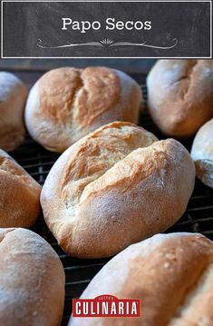 several loaves of bread sitting on top of a grill with the words papo secos