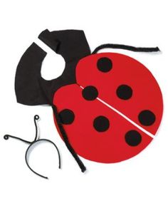 a ladybug costume and sewing kit on a white background