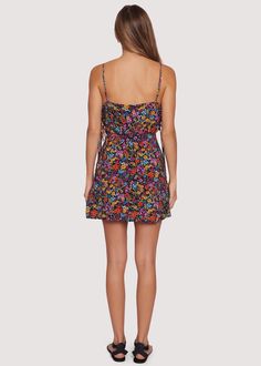 Hit your summer style out of the park with the Flora Garden Mini Dress. This causal silhouette features a sultry side lace up detail for a flirtatious look. Classic style details include a square neckline, pockets, back zipper, and fully lined construction. You are assured to look effortlessly chic whatever the occasion. With a beautiful black floral print, this dress adds a touch of femininity that will take your look to the next level. WDWE13931 Imported 100% Rayon Model is 5 ft 9 inches; Bust Fitted Dress With Lace-up Back For Vacation, Mini Length Dresses With Back Zipper For Day Out, Square Neck Tie Back Dress For Night Out, Date Night Dresses With Smocked Back And Spaghetti Straps, Lined Summer Dresses With Straight Neckline, Lined Dresses With Straight Neckline For Day Out, Vacation Dress With Tie Back And Straight Neckline, Summer Mini Dress With Back Zipper, Floral Print Sundress With Straight Neckline For Day Out