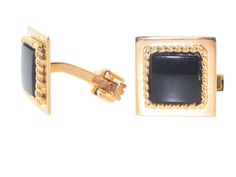 Subtle Savoir Faire, these Charles Gold & Co. black onyx cufflinks are the height of class. A square black onyx is bordered by woven gold and set on a larger square of high-polish gold. These estate black onyx cufflinks were made by master jewelers Charles Gold & Co., who manufactured jewelry for Van Cleef and Arpels. Luxury Rectangular Cufflinks With Polished Finish, Luxury Black Cufflinks For Formal Occasions, Black Luxury Cufflinks For Formal Occasions, Black Luxury Cufflinks For Formal Wear, Luxury Black Formal Cufflinks, Classic Black Jewelry For Formal Occasions, Black Classic Jewelry For Formal Occasions, Luxury Square Earrings For Formal Occasions, Elegant Rectangular Cufflinks With Polished Finish