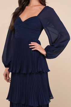 Let everyone be impressed by your stunning style in the Lulus Impactful Elegance Navy Blue Tiered Balloon Sleeve Maxi Dress! Airy, lightweight woven fabric shapes this gorgeous dress that has long balloon sleeves with elastic at the cuffs and shoulders. Sweetheart neckline tops a pleated bodice with a ruched detail at the front and a fitted waist. Accordion-pleated skirt falls in graceful tiers to a maxi hem. Hidden zipper/clasp at back. Fit: This garment fits true to size. Length: Floor length. Pleated Skirt Fall, Sweetheart Neckline Top, Dress With Pleats, Stunning Style, Bridal Party Dresses, Adhesive Bra, Pleated Bodice, Sleeve Maxi Dress, Long Sleeve Maxi