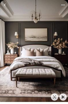 a large bed sitting in a bedroom on top of a wooden floor