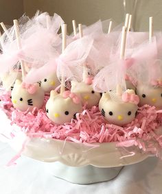 hello kitty cake pops in a white bowl