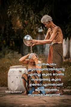 an old man is washing his face with water from a faucet in front of him