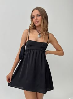 Slim fitting mini dress Adjustable shoulder straps, square neckline, invisible zip fastening at back, pleats under bust Non-stretch, fully lined 100% polyester Cold machine wash Hoco Inspo, All Black Dresses, Brunch Dress, Asymmetrical Hem Dress, Hoco Dress, Mini Dress Fashion, Tie Waist Dress, Grad Dresses, Mini Dress Black