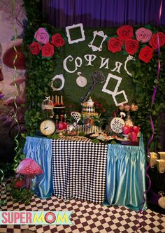 a table topped with lots of food and decorations