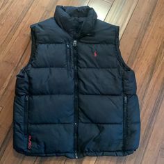 This Is A Polo By Ralph Lauren Bipolar Puffer Vest. There Is One Breast Zippered Pocket And Two Additional Zippered Pockets In The Front. This Is An Excellent Use Condition. Ralph Lauren Puffer, Puffer Vest, Polo By Ralph Lauren, Men's Polo, Polo Ralph, Zipper Pocket, Black Red, Mens Polo, Mens Jackets