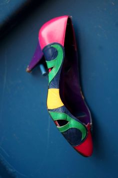 Bold and fun, everything we love about the 80s is embodied in this Beverly Feldman design. Known for her great use of colour, this statement heels stands out with a mix of colours and patterns.   Size: EU 38 Fabric:  Suede  Measurements length:25cm width:7cm height of heel:8cm Condition: the heels have some wear and there is a loose thread Infront as well, please see the images. 80s Dress Shoes Women, 80s High Heels, Retro Synthetic Heels, Multicolor Closed Toe Retro Heels, Multicolor Retro Closed Toe Heels, Retro Multicolor Closed Toe Heels, 1980’s Shoes, 80s Shoes Women Heels 1980s, Retro Multicolor Pointed Toe Heels