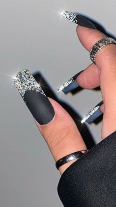 10 Matte Sparkle Nail Ideas That Balance Glamour and Minimalism Check more at https://lizy.in/10-matte-sparkle-nail-ideas-that-balance-glamour-and-minimalism/ Matte Black Nails Glitter Tips, Nye Nails Coffin Glitter, Glitter On Matte Nails, Silver Chrome Nails With Rhinestones, Pretty Matte Nails, All Sparkle Nails, All Glitter Nails Sparkle, Black Crome Nails Design, Black And Sparkly Nails