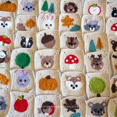 crocheted squares with animals and trees on them are arranged to look like they have been knitted together