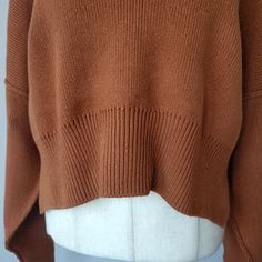 Brown Cropped Crew Neck Sweater For Fall, Trendy Oversized Cropped Sweater For Fall, Chic Cropped Funnel Neck Sweater, Fall Crew Neck Cropped Sweater, Chic Cropped Turtleneck Sweater With Ribbed Cuffs, Chunky Knit Cropped Top For Fall, Versatile Cropped Sweater For Winter Layering, Cozy Oversized Cropped Sweater, Cropped Soft Knit Layering Sweater