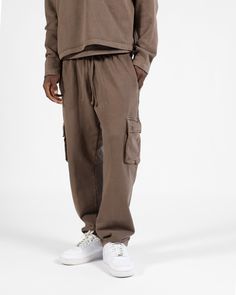 Crafted from a premium 450GSM 100% Cotton terry fabric, these cargo sweatpants use the same silhouette as our open bottom sweatpants but feature cargo pockets with button closure and double back pockets. A specialized mineral stone wash has been used to obtain a vintage look, ensuring each piece is one-of-a-kind. 100% Cotton 450GSM Preshrunk and no pilling after wash Relaxed fit Due to this garment's unique wash process there may be slight color variation between different pieces Relaxed Fit Straight Leg Sweatpants With Multiple Pockets, Relaxed Fit Cargo Style Joggers For Loungewear, Utility Style Sweatpants For Loungewear, Utility Sweatpants With Pockets For Loungewear, Utility Style Relaxed Fit Sweatpants With Pockets, Utility Style Sweatpants With Pockets And Relaxed Fit, Utility Sweatpants With Pockets And Relaxed Fit, Relaxed Fit Loungewear Pants With Multiple Pockets, Relaxed Fit Lounge Pants With Multiple Pockets