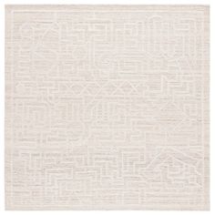 a white rug with an intricate design on the front and back side, in shades of beige