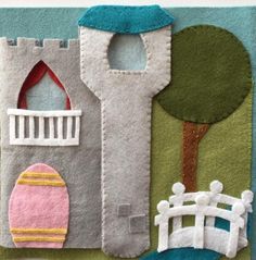 a felt house with a tree and fence