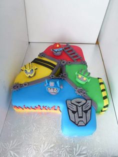 a birthday cake made to look like the characters from the animated movie opttropict