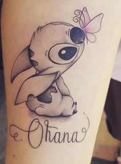 a tattoo with an image of the character stitching on it's leg and name