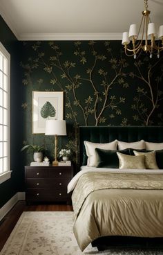 a bedroom with green wallpaper and gold bedding