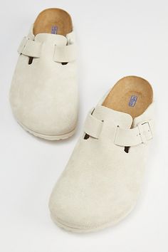 Classic Birkenstock Boston clogs with a soft footbed. Essential suede clogs with buckle closures at the sides. Features a molded footbed for comfortable wear and a textured EVA outsole. Features Birkenstock Boston soft footbed clog Slip on suede clogs Buckle side closure Molded footbed Textured outsole Content + Care Suede, leather, rubber Spot clean Imported Size + Fit Birkenstock regular width Fits like a medium D width | Birkenstock Boston Soft Footbed Clog in White, Men's at Urban Outfitters White Boston Clogs, Birkenstock Boston Soft Footbed, Birkenstock Boston Clogs, Boston Soft Footbed, White Birkenstocks, Boston Clogs, White Nike Shoes, Preppy Shoes, Pretty Shoes Sneakers