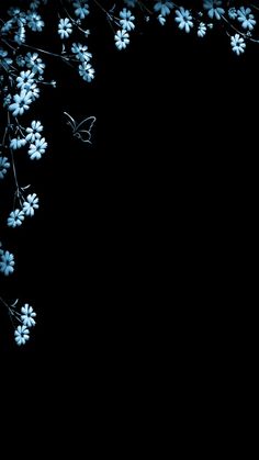 some blue flowers and a butterfly on a black background